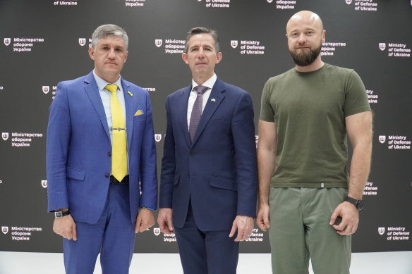 Opposition foreign spokesman Simon Birmingham with Ukraine’s Deputy Minister of Defence Dmytro Klimenkov (right) and Deputy Defence Minister for Euro Atlantic Integration Oleksandr Balanutsa in Kyiv last week.